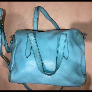 Light blue fossil handbag.